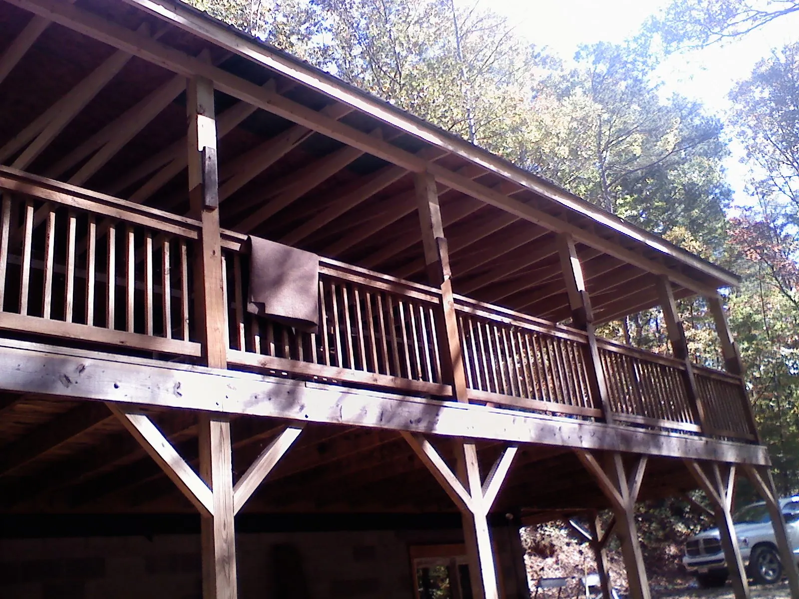 Timber framing under a new elevated porch and deck — Roof Leak Repair in Cardinal by Roofing Brothers